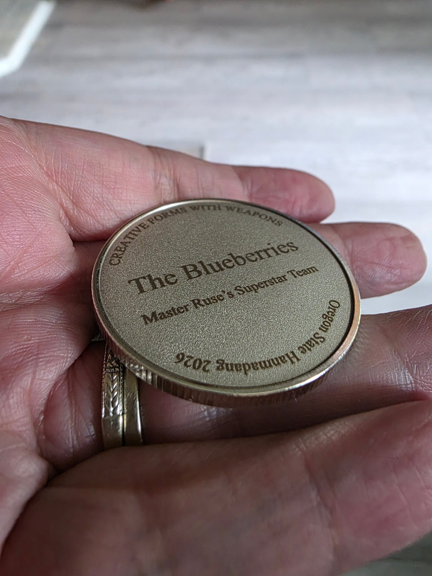 Custom Double-Sided Laser Engraved Coin with 3D Printed Twist Holder